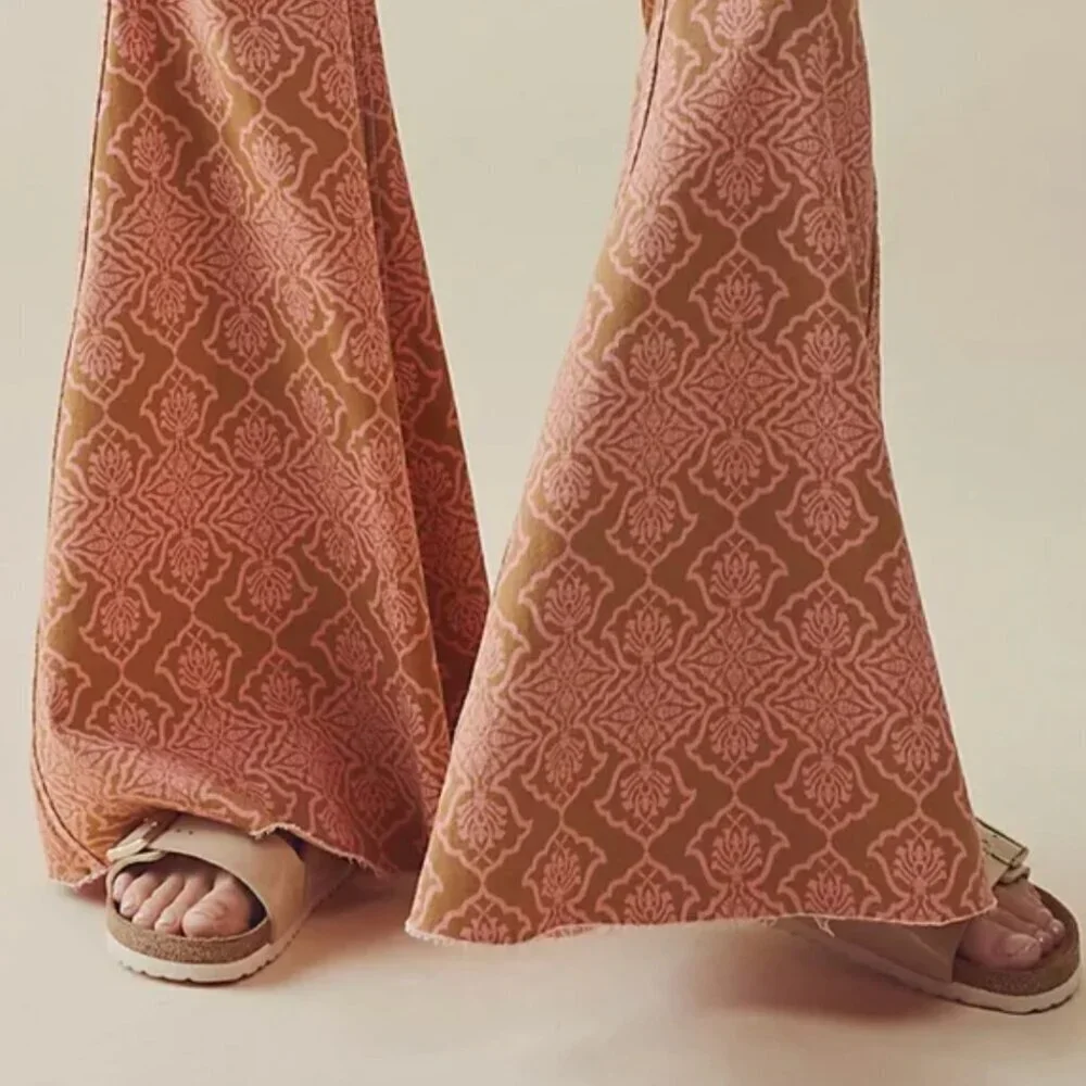 Free People Throw It Back Reversible Flare Jeans in Pink Combo